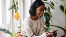 
  Young person communicating with a cell phone
