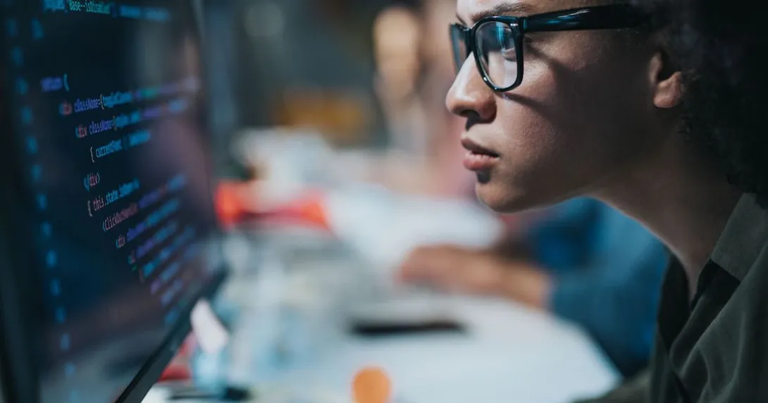 A computer programmer focused on coding